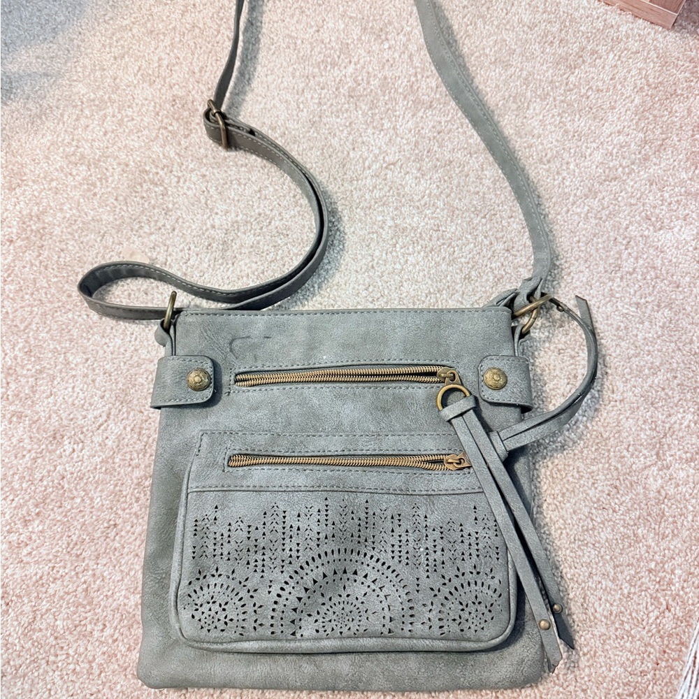 Stylish Gray Crossbody Bag with Brass Details